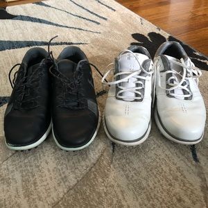 Under Armour black and white pair of spikeless men’s golf shoes size 9
